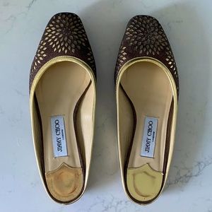 Jimmy Choo Brown metallic backless flats.